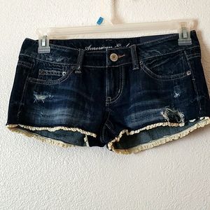 AE Distressed Denim Lace Trimmed Shortie Shorts